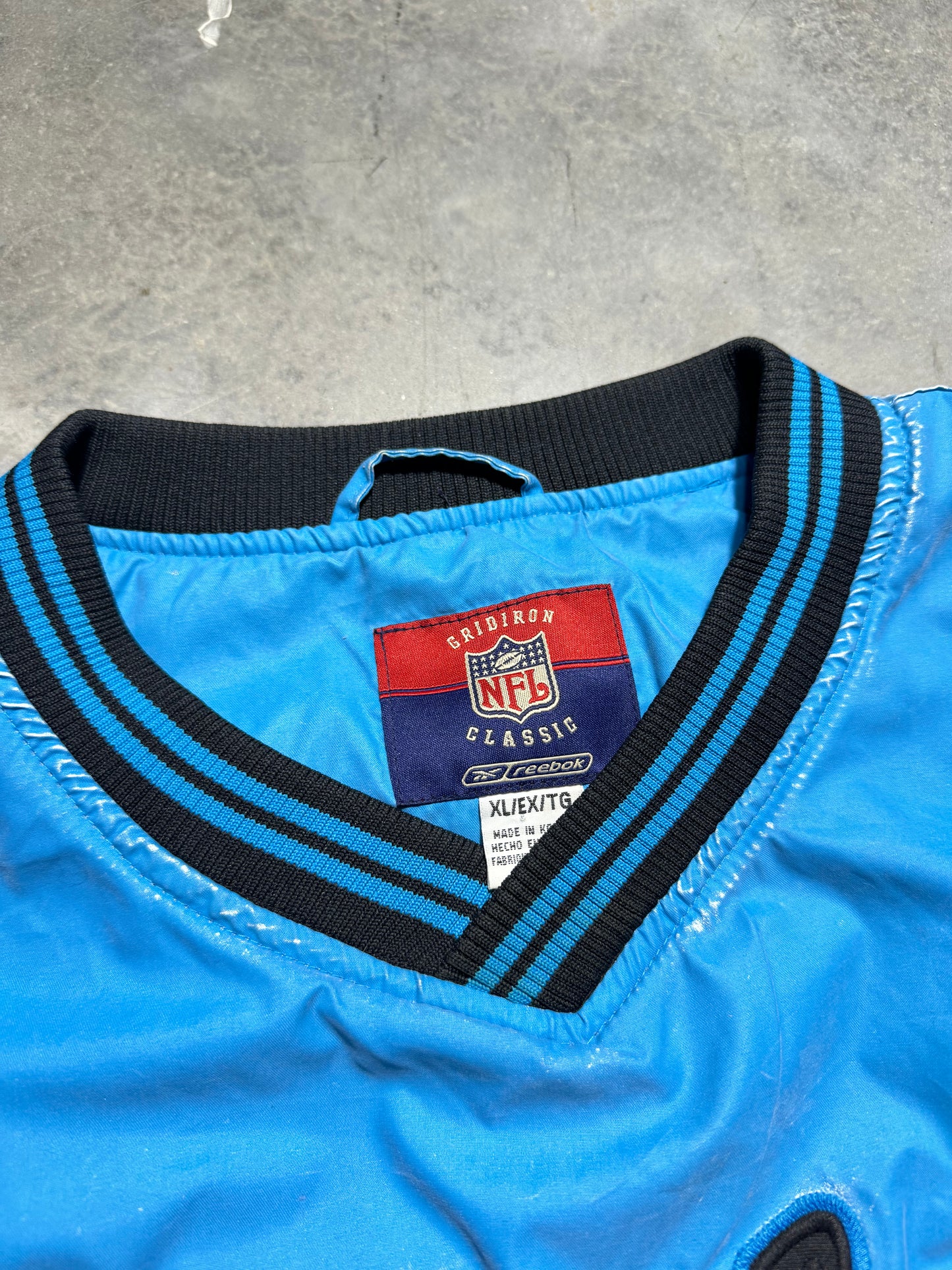 2003 Carolina Panthers Vintage Electric Blue Script Spellout Reebok Gridiron Collection Throwback Embroidered NFL Pullover Jacket (XL)