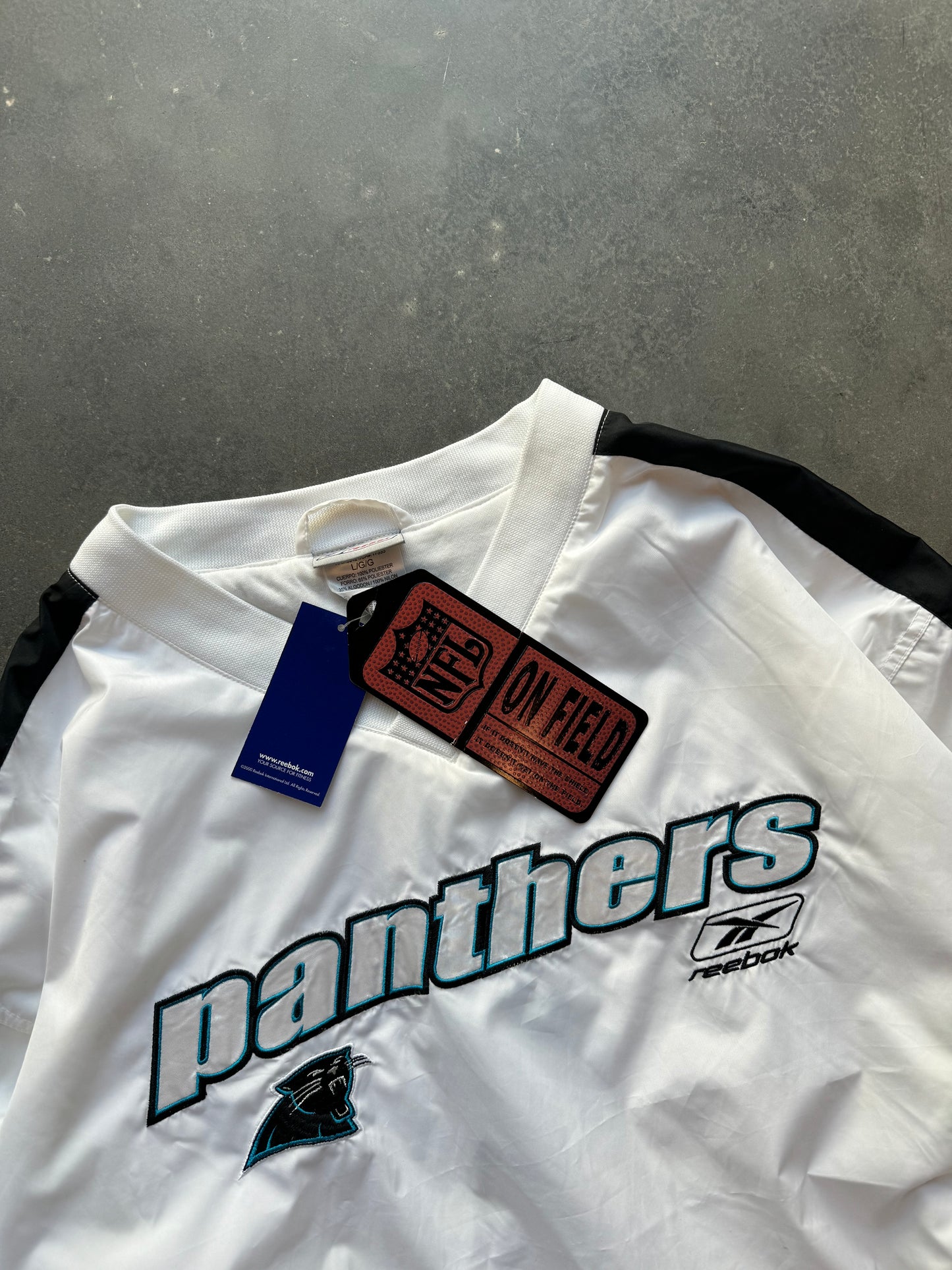 00’s Carolina Panthers Vintage Reebok White Nylon Spellout NFL Pullover - Deadstock (Large)