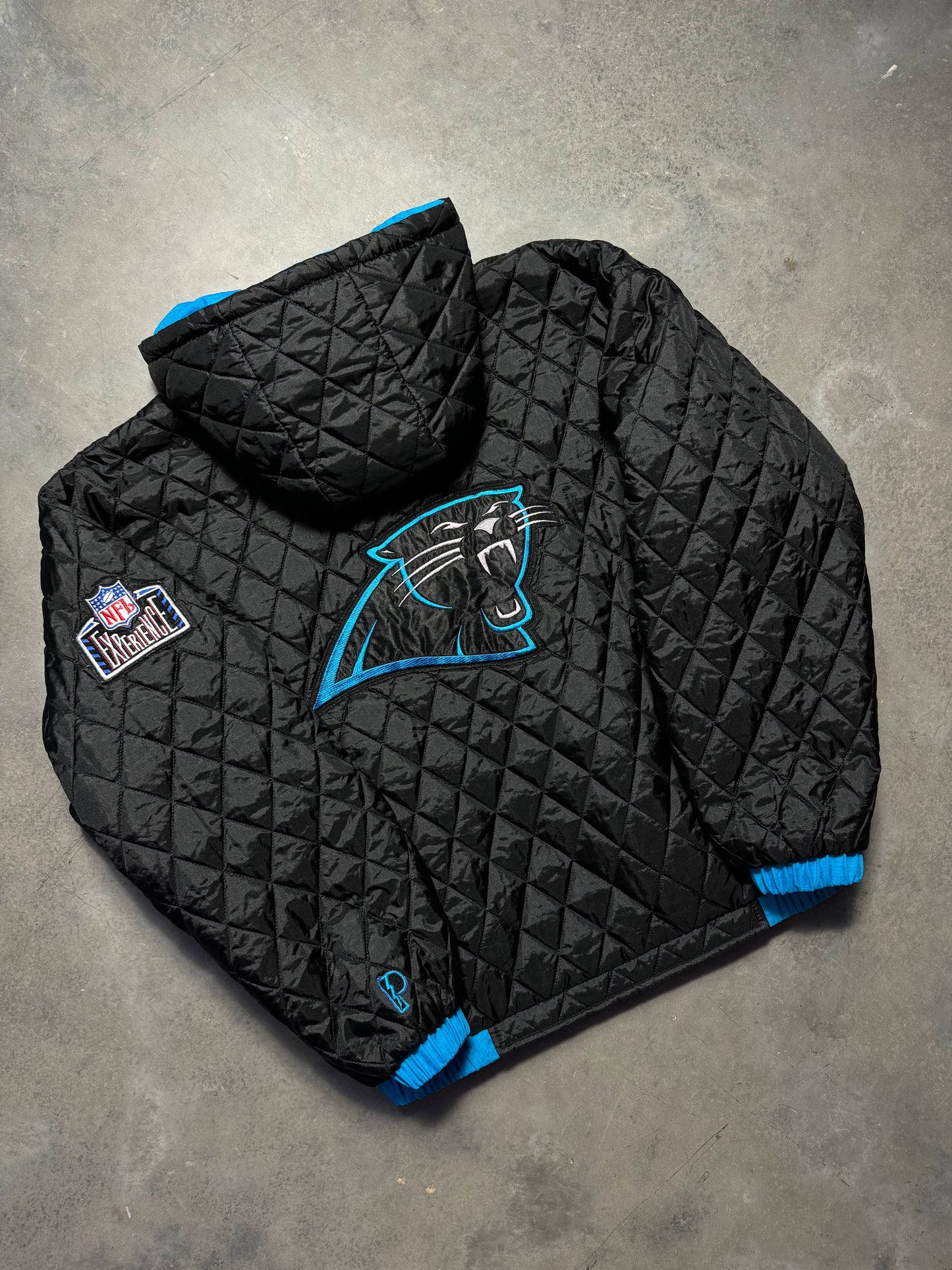 90’s Carolina Panthers Vintage Reversible Pro Player Quilted NFL Puffer Jacket (Large)
